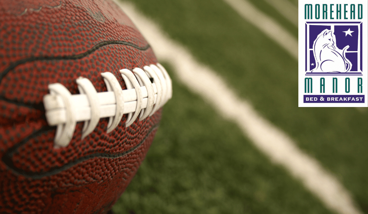 Durham Football Duke and NCCU football on field